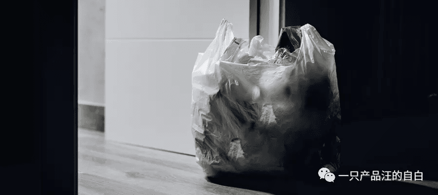 Two People Rummaging Through Trash Late at Night